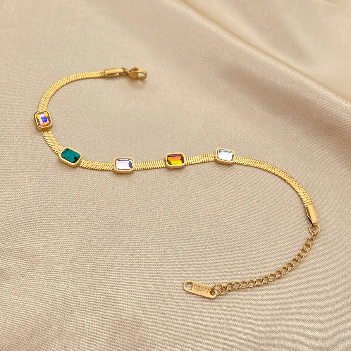 Arcadia Bracelet - Gold Tone Adjustable Bolo Bracelet (I-J Color Yellow GOLD) crested with five ruby's enhance outfit and jewelry collection, perfect for any occasion. - Authentifactor