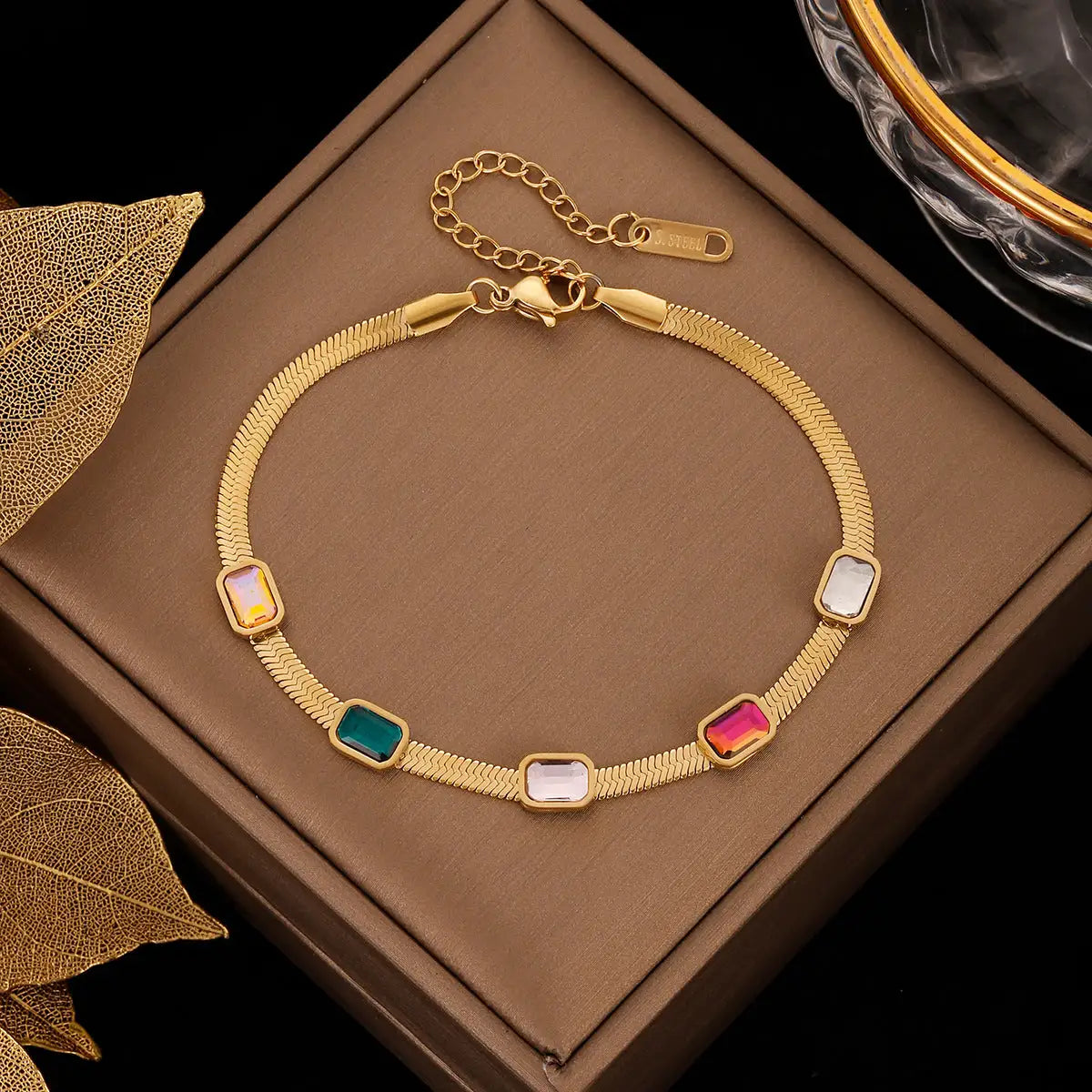 Arcadia Bracelet - Gold Tone Adjustable Bolo Bracelet (I-J Color Yellow GOLD) crested with five ruby's enhance outfit and  jewelry collection, perfect for any occasion.