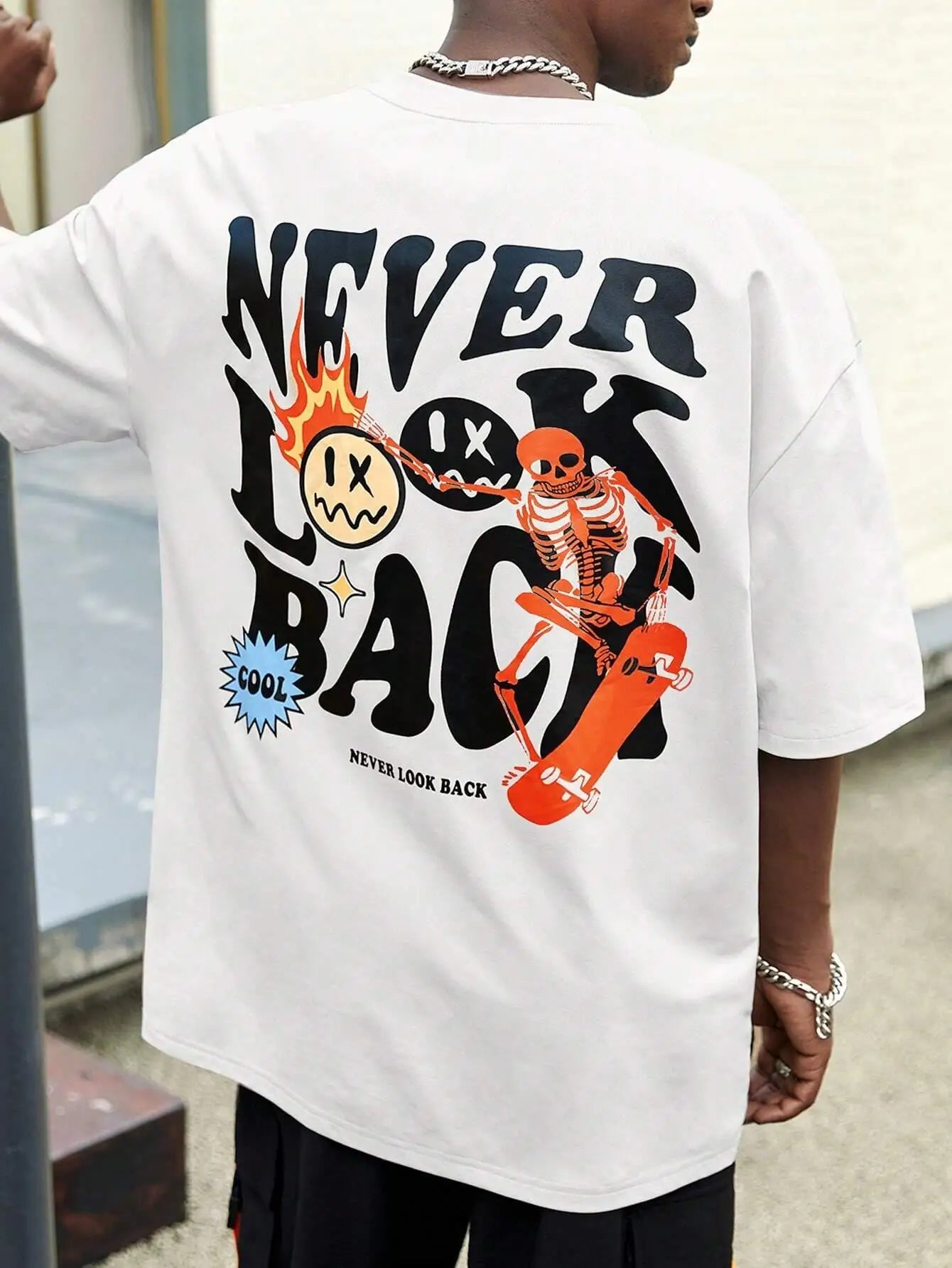 "Never Look Back: Trendy Skull Print Cartoon Tee - Stylish Cotton Crewneck for Men"