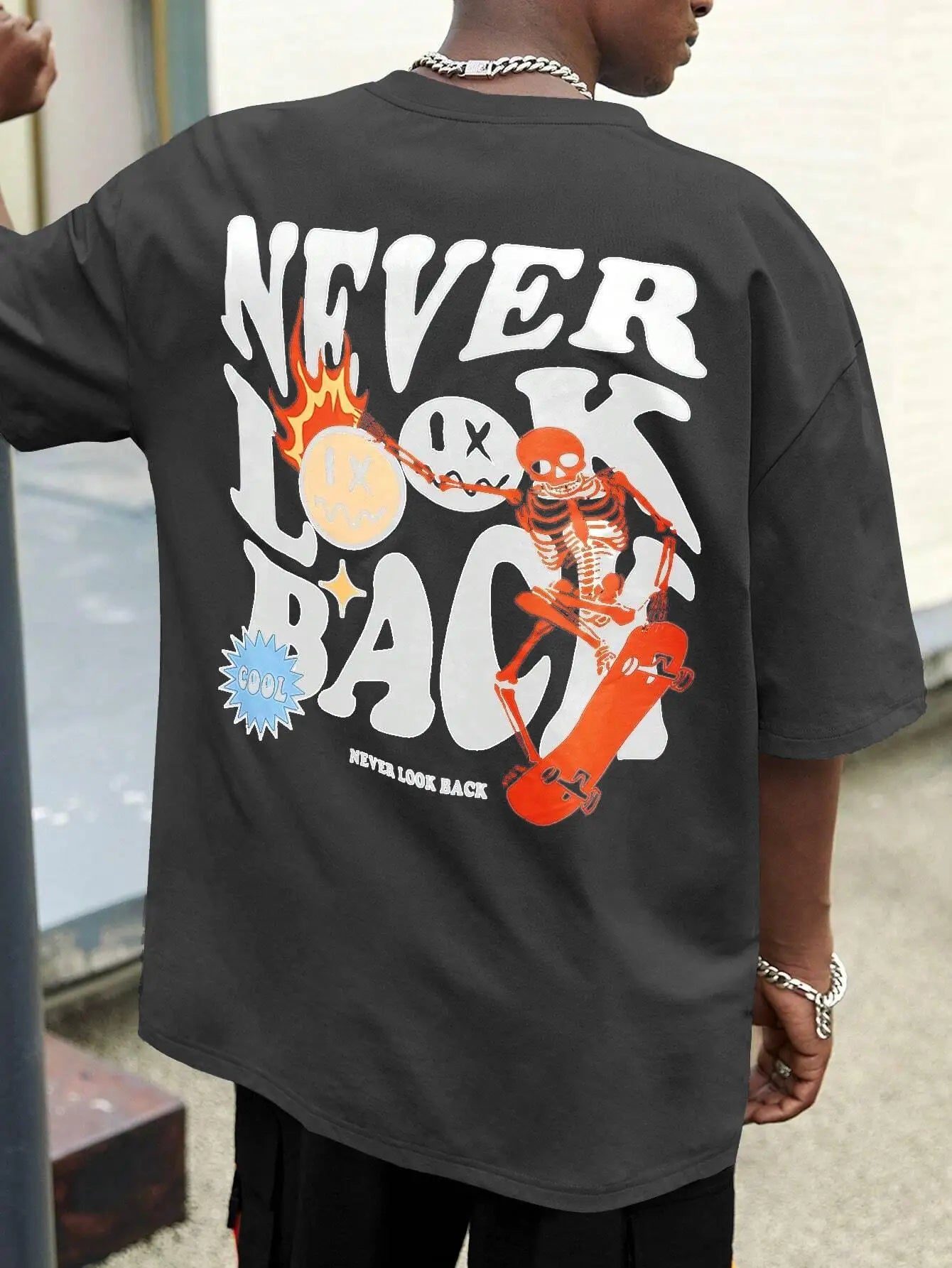 "Never Look Back: Trendy Skull Print Cartoon Tee - Stylish Cotton Crewneck for Men"